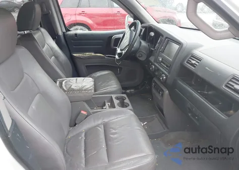 2009 Honda Ridgeline Rtl z USA, uszkodzony, nr VIN 5FPYK16549B104437